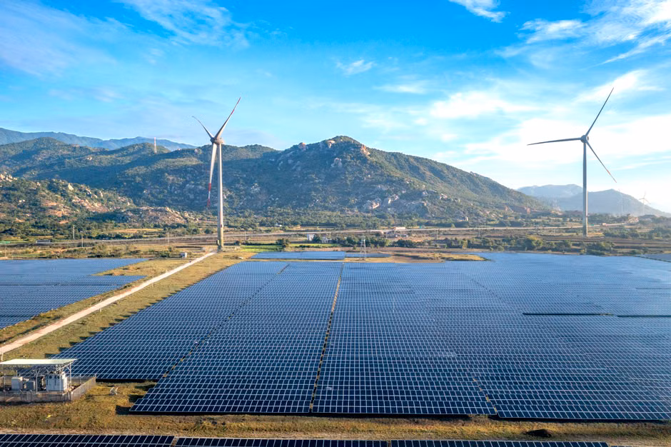 EU Ecolabel for Spas: Sustainability Certification and Requirements Aerial view of wind turbines and solar panels in Ninh Thuan, Vietnam, showcasing renewable energy.